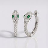 natural diamond and green emerald snake heart earrings in 14k gold white gold
