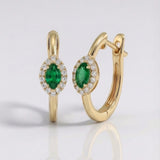 pear shape emerald and natural diamond halo earrings in 14k gold