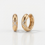 criss cross natural diamond huggie earrings in 14k gold