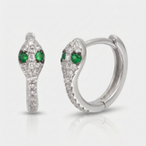 natural diamond snake huggie earrings with green gemstone eyes in 14k gold white gold