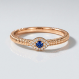 blue sapphire and natural diamond halo ring in 14k gold rose gold