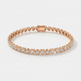 natural diamond bezel heart tennis bracelet in 14k gold rose gold