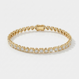 natural diamond bezel heart tennis bracelet in 14k gold