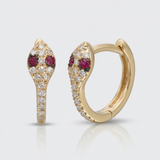 natural diamond snake huggie earrings with ruby eyes in 14k gold