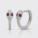 natural diamond snake huggie earrings with ruby eyes in 14k gold white gold