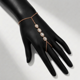 bezel set natural diamond floral station hand chain in 14k gold rose gold